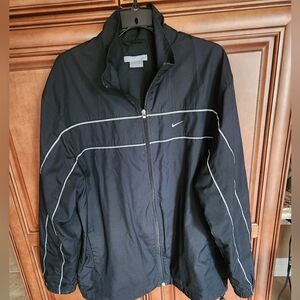 Nike Mens Vintage windbreaker in black with silver reflective stripes, size L